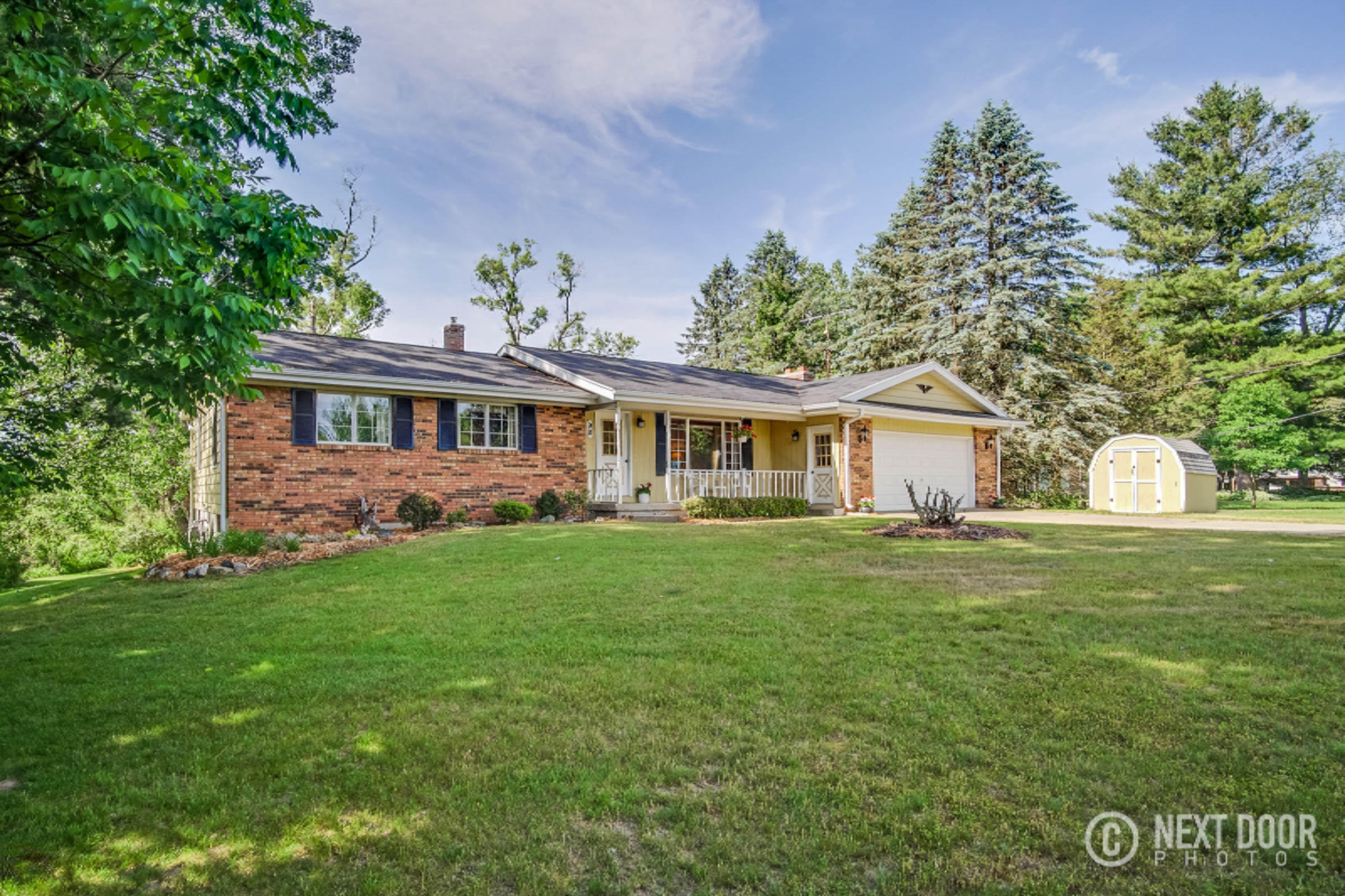 90 Indian Lakes Road Northeast Sparta, MI 49345 - Photo 1 of 72 Nicely Wooded