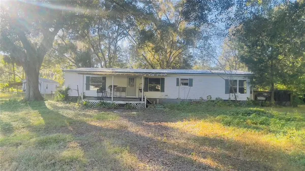 a view of a yard in front of house