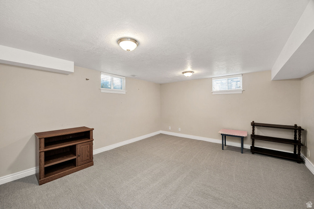 80 North 500 West Logan, UT 84321 - Photo 22 of 36 Carpeted room with neutral wall tones and white trim