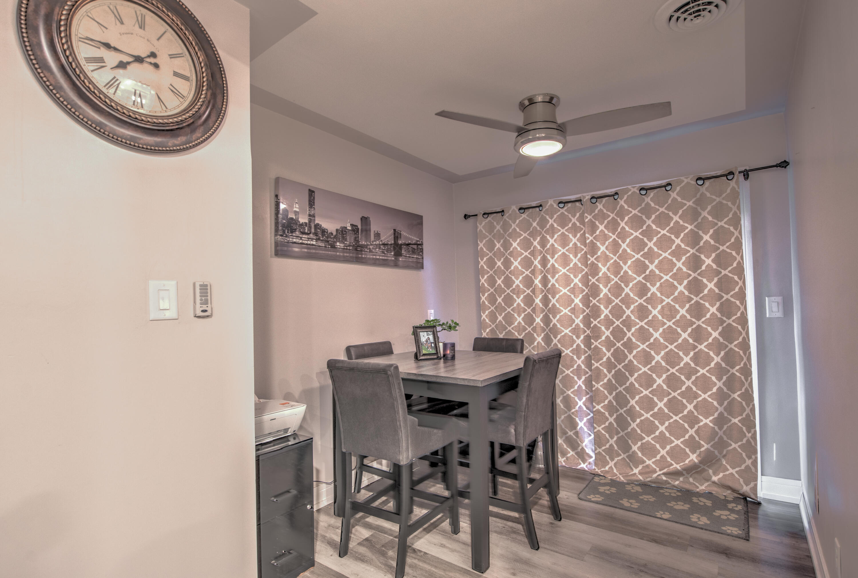 2080 Wright Street Gary, IN 46404 - Photo 11 of 20 a dining room with furniture and a clock fan