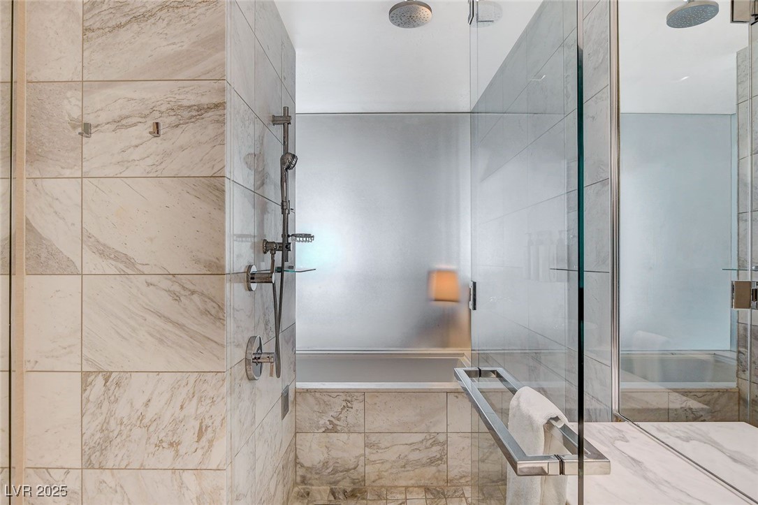 4381 West Flamingo Road, Unit 2204 Las Vegas, NV 89103 - Photo 20 of 27 Full bathroom featuring a stall shower