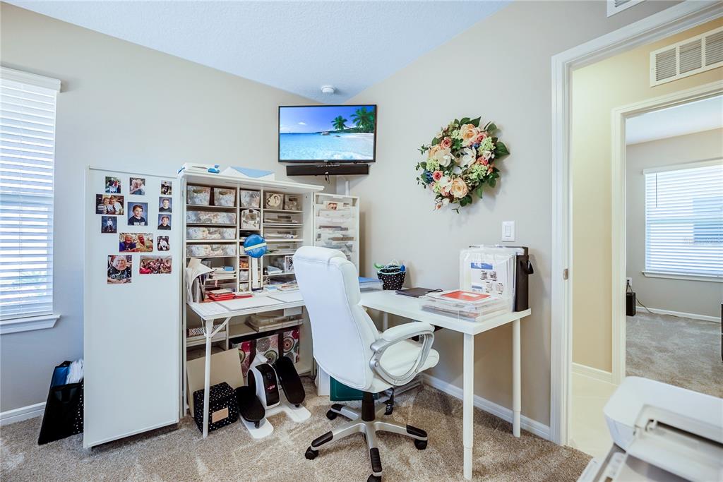 8344 Southwest 54th Loop Ocala, FL 34481 - Photo 20 of 36 a view of a workspace with furniture
