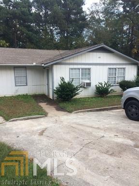 205 Glenview Terrace Winder, GA 30680 - Photo 1 of 1 a front view of a house with a yard and garage
