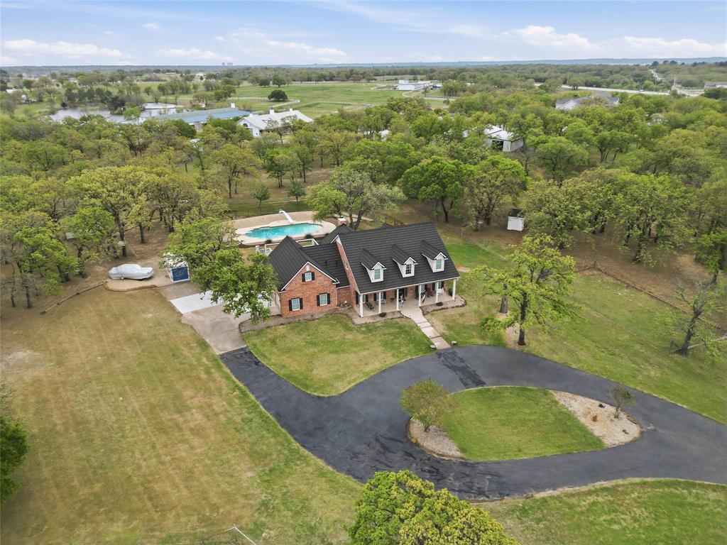 4800 Shiloh Road Double Oak, TX 75022 - Photo 3 of 40 an aerial view of residential houses with outdoor space and trees