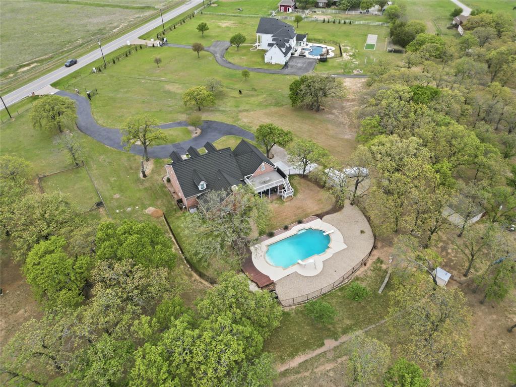 4800 Shiloh Road Double Oak, TX 75022 - Photo 33 of 40 an aerial view of a house with a yard basket ball court