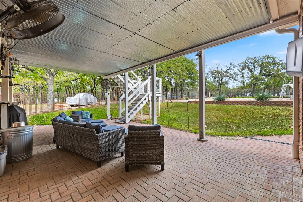 4800 Shiloh Road Double Oak, TX 75022 - Photo 8 of 40 a sitting area with furniture and garden view