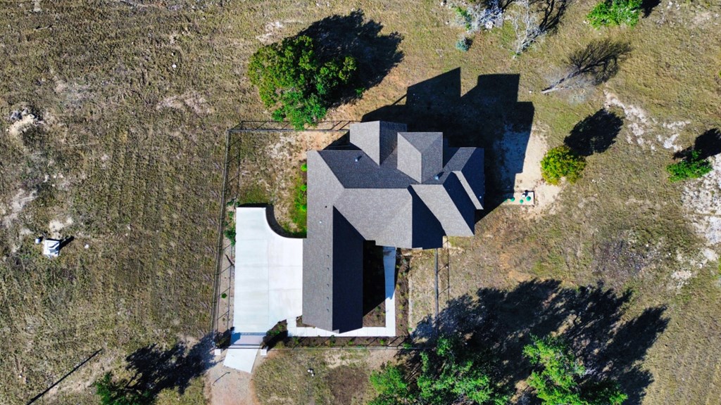 517 Dancing Sun Road Fredericksburg, TX 78624 - Photo 5 of 37 an aerial view of a house with a yard