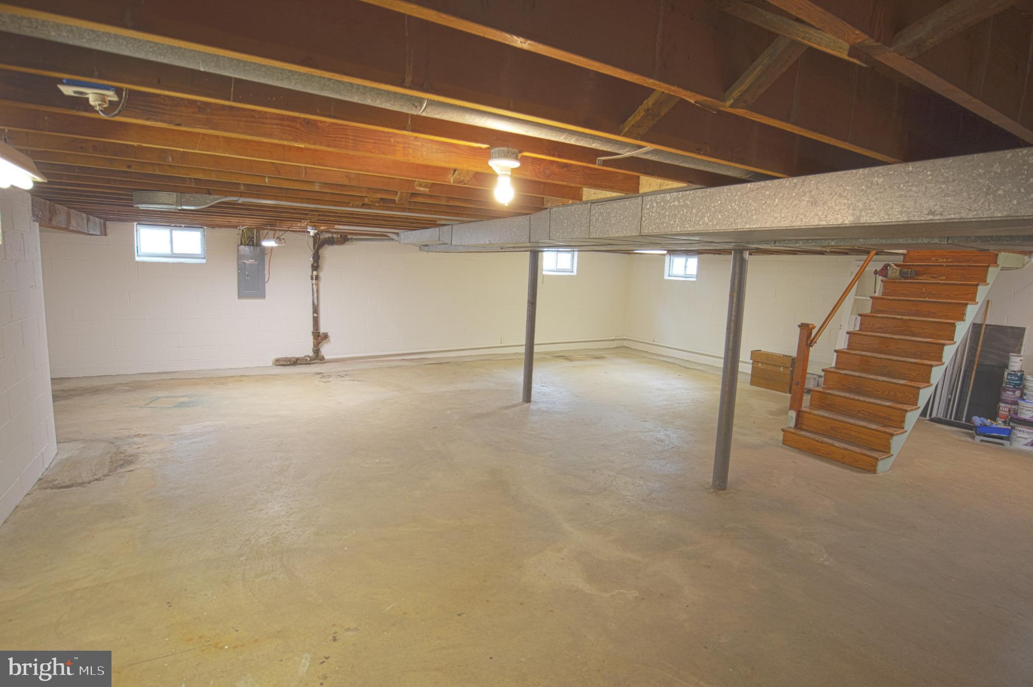 180 Carroll Road Pasadena, MD 21122 - Photo 20 of 28 Spacious basement ready for your vision.