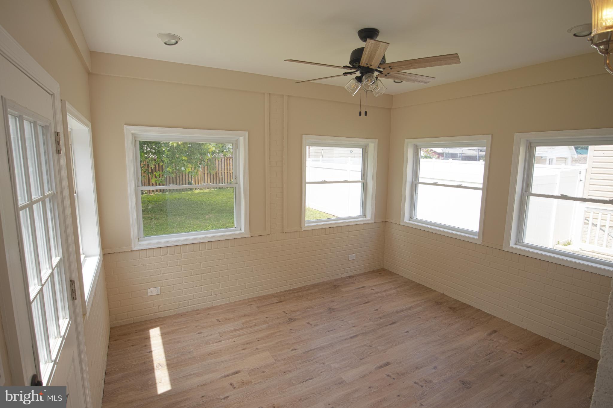 180 Carroll Road Pasadena, MD 21122 - Photo 10 of 28 Bright and airy sunlit room with windows.