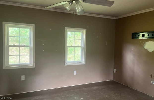 1220 Arner Road Chester, WV 26034 - Photo 8 of 24 Empty room featuring crown molding and ceiling fan