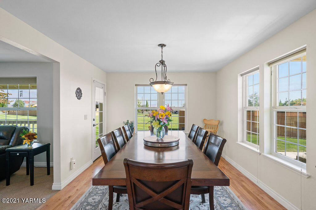 13050 West Barrett Road Yakima, WA 98908 - Photo 10 of 55 a view of a dining room with furniture window and outside view