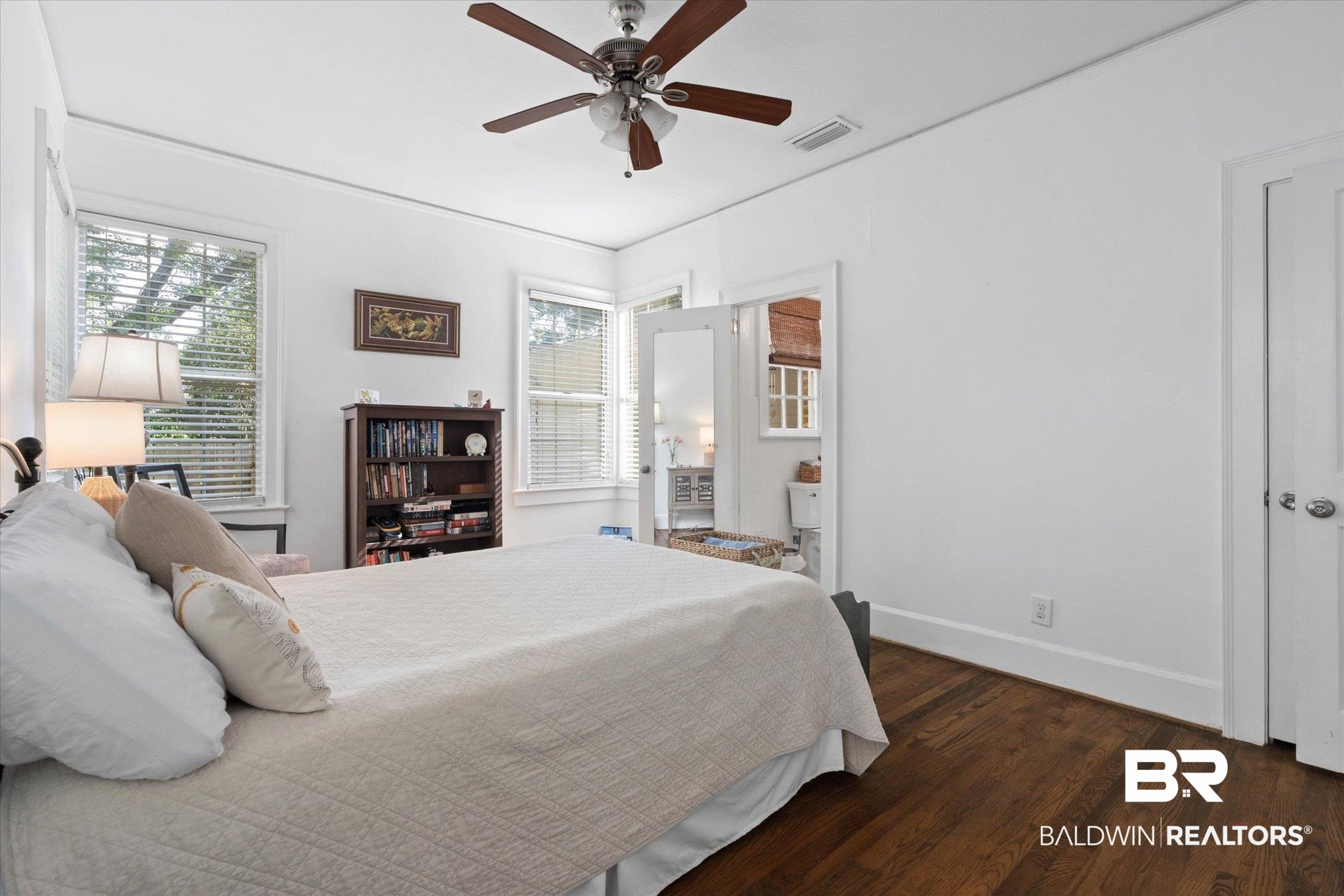 1910 Hunter Avenue Mobile, AL 36606 - Photo 14 of 21 Bedroom with wood finished floors, baseboards, and ceiling fan