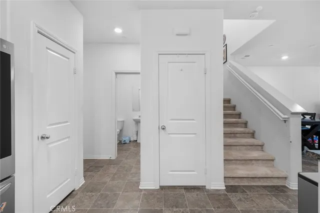 a view of entryway with stairs