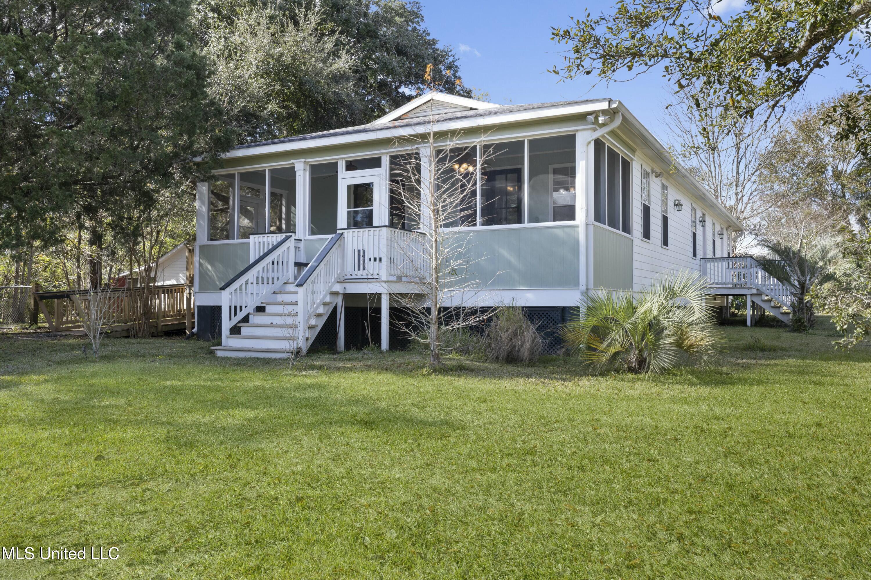 104 Felicity Street Bay St. Louis, MS 39520 - Photo 1 of 75 tempImageYvmuir