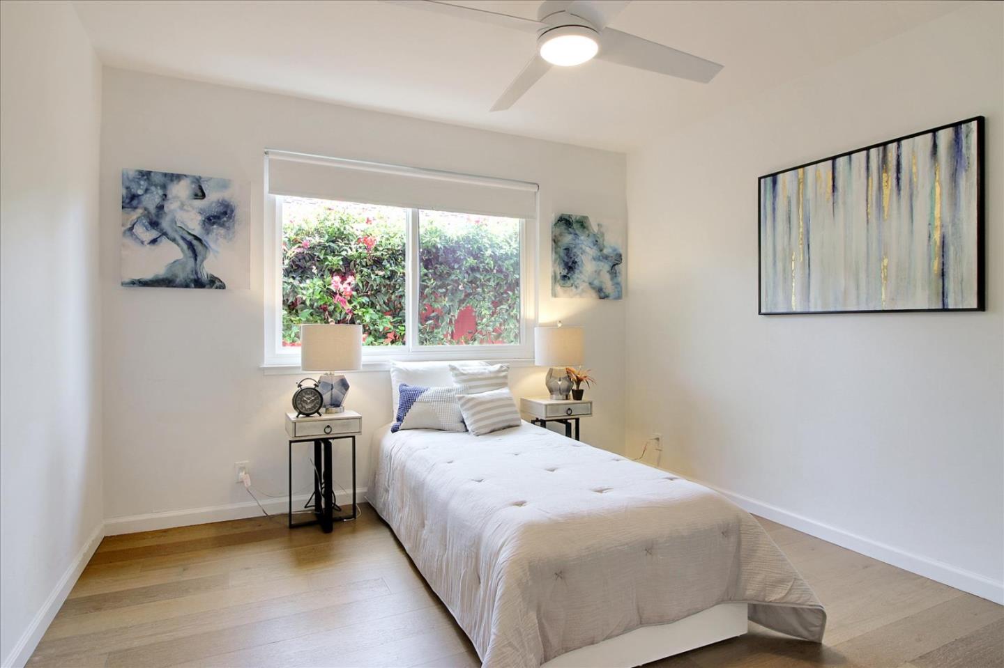 1435 Floyd Avenue Sunnyvale, CA 94087 - Photo 17 of 36 a bedroom with a bed and a window