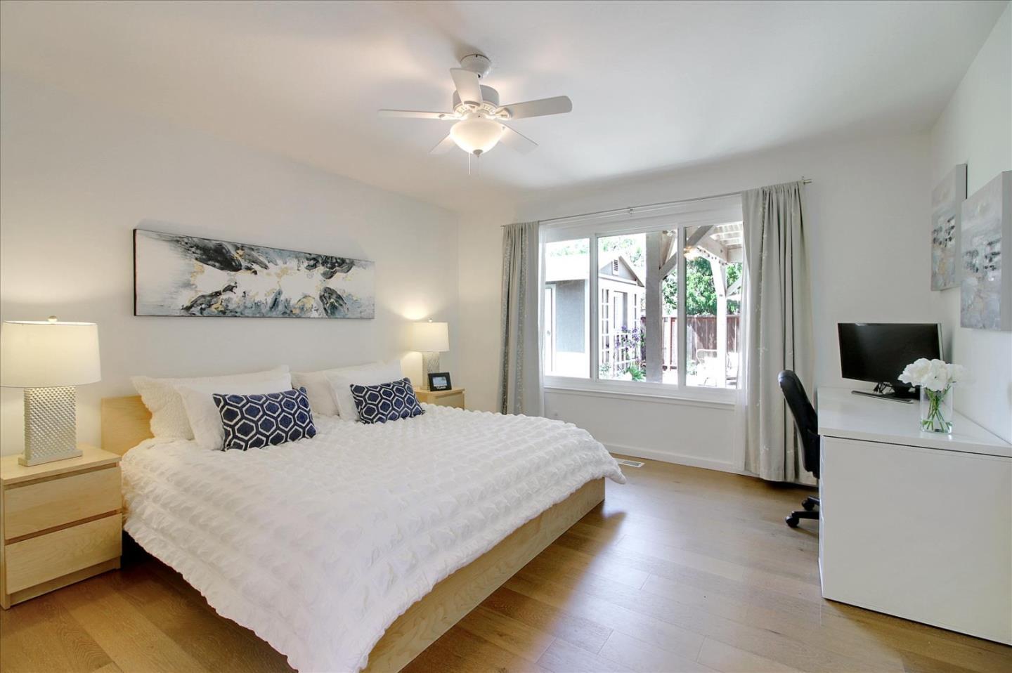 1435 Floyd Avenue Sunnyvale, CA 94087 - Photo 18 of 36 a bedroom with a bed and a window