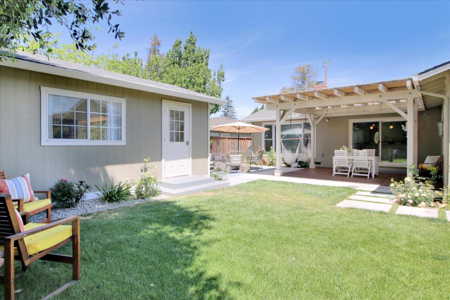 1435 Floyd Avenue Sunnyvale, CA 94087 - Photo 30 of 36 a view of a house with backyard porch and sitting area
