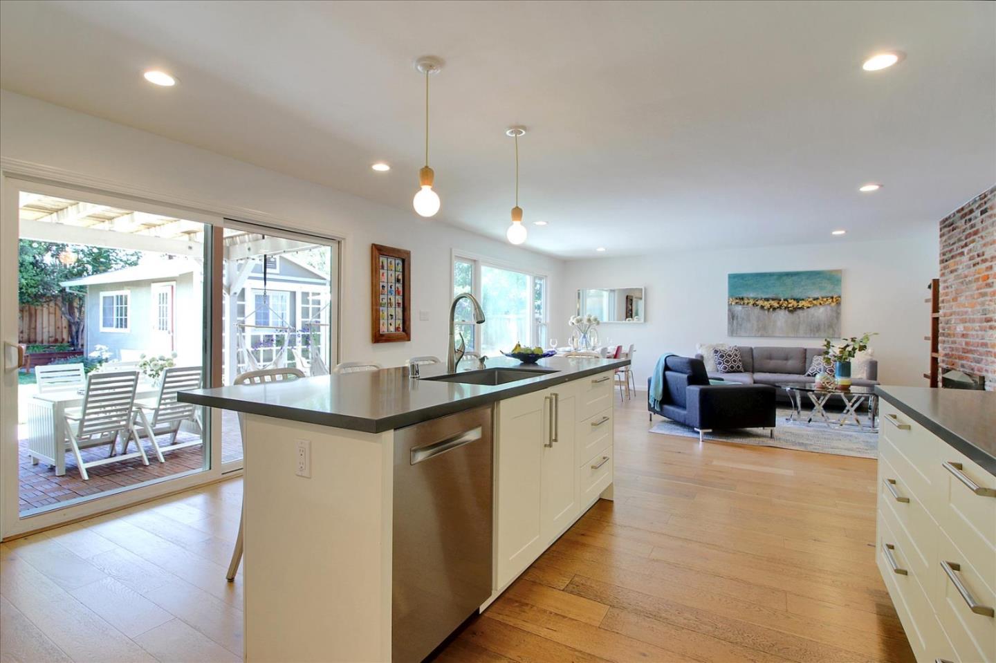 1435 Floyd Avenue Sunnyvale, CA 94087 - Photo 10 of 36 a large white kitchen with a large window