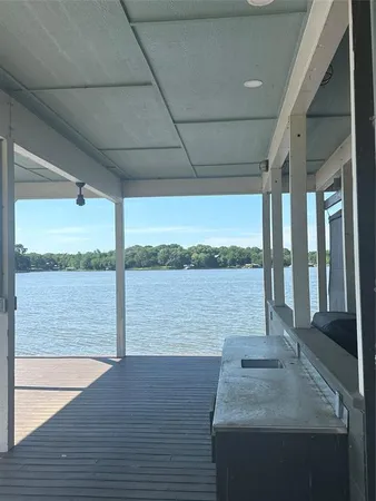 a view of a lake from a balcony