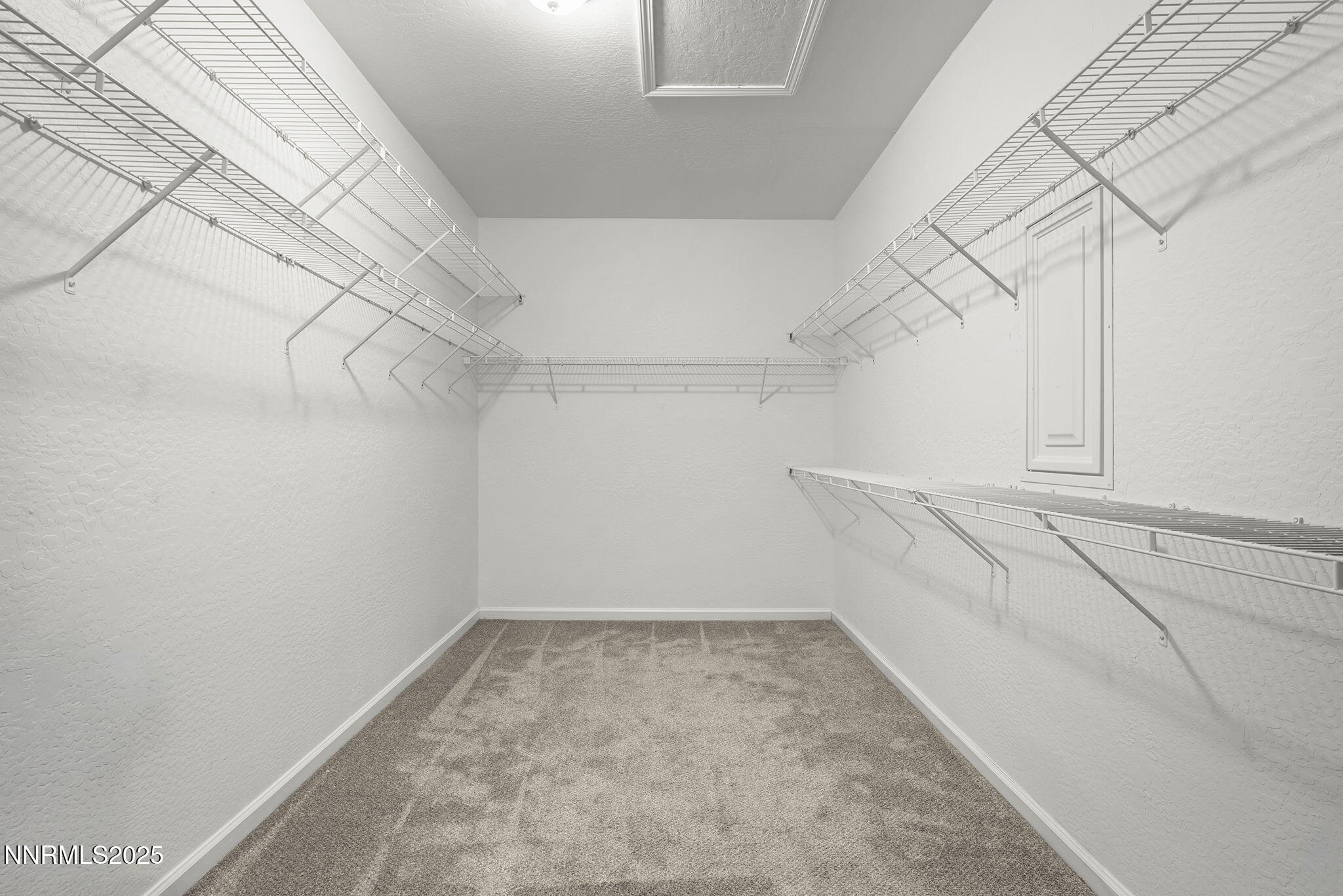 1240 Cliff Park Way Reno, NV 89523 - Photo 21 of 34 a view of a room with racks on the wall