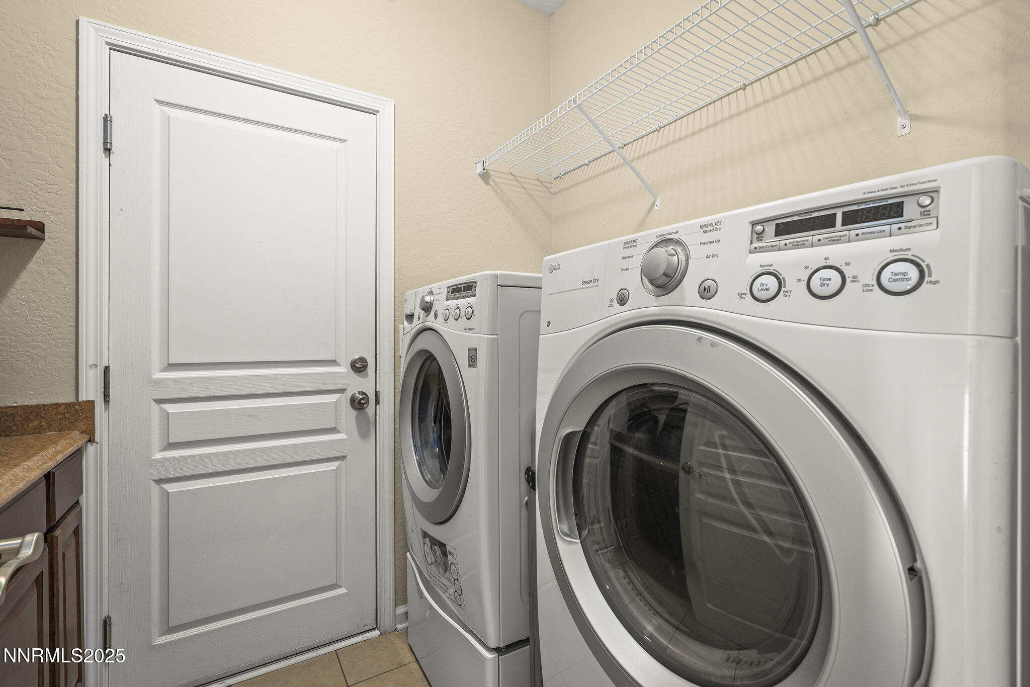 1240 Cliff Park Way Reno, NV 89523 - Photo 24 of 34 a utility room with dryer and washer