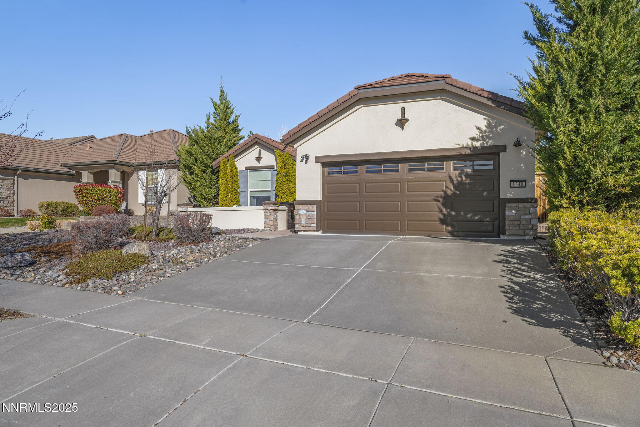 1240 Cliff Park Way Reno, NV 89523 - Photo 28 of 34 a front view of a house with a yard