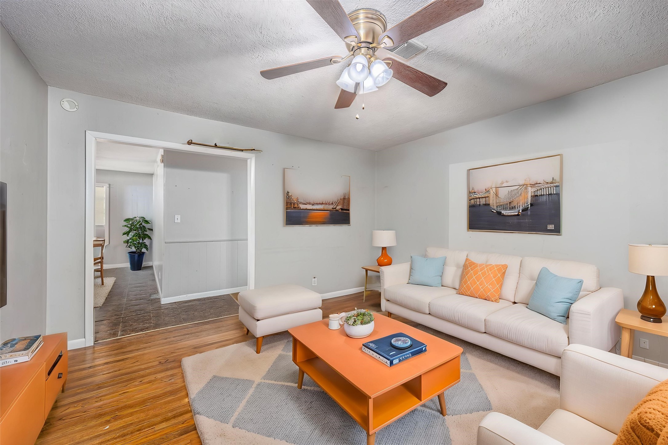 502 Massey Tompkins Road Baytown, TX 77521 - Photo 7 of 32 a living room with furniture a rug and a chandelier