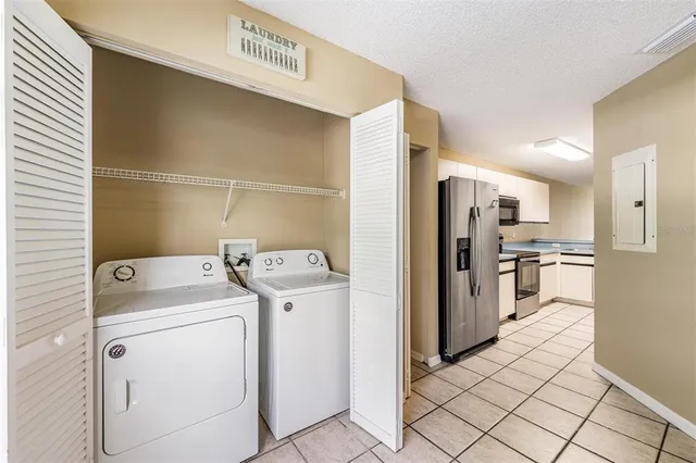 a view of a storage & utility room with washer and dryer