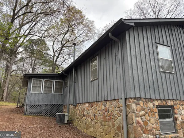 a front view of a house with garage