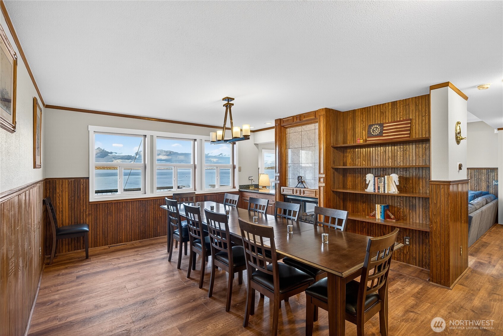 5972 Hastings Road Clinton, WA 98236 - Photo 15 of 40 a view of a dining room with furniture and wooden floor