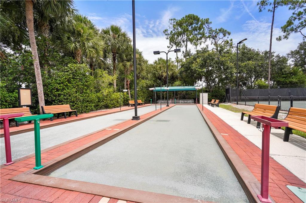 6522 Waverly Green Way Naples, FL 34110 - Photo 26 of 30 swimming pool view from a balcony