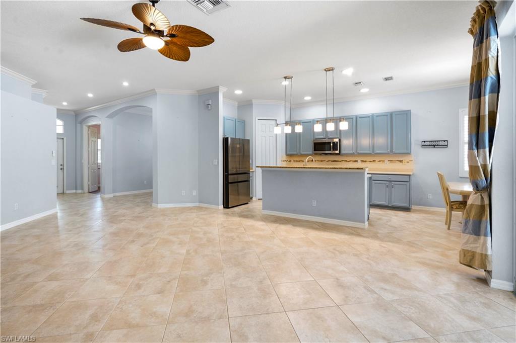 6522 Waverly Green Way Naples, FL 34110 - Photo 4 of 30 a view of kitchen and window
