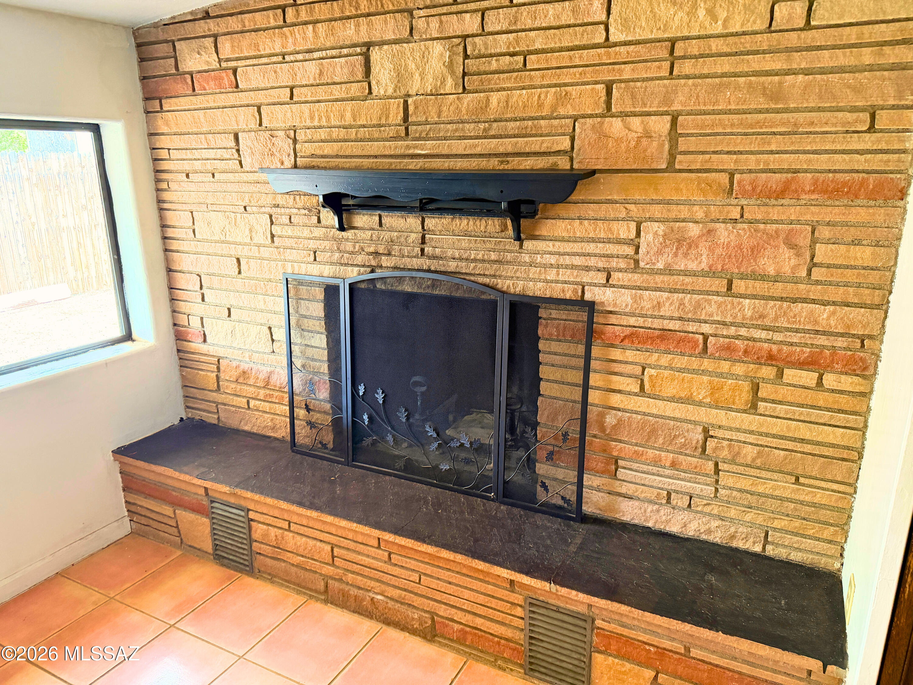 3383 North Flowing Wells Road Tucson, AZ 85705 - Photo 16 of 47 Family Room Fireplace