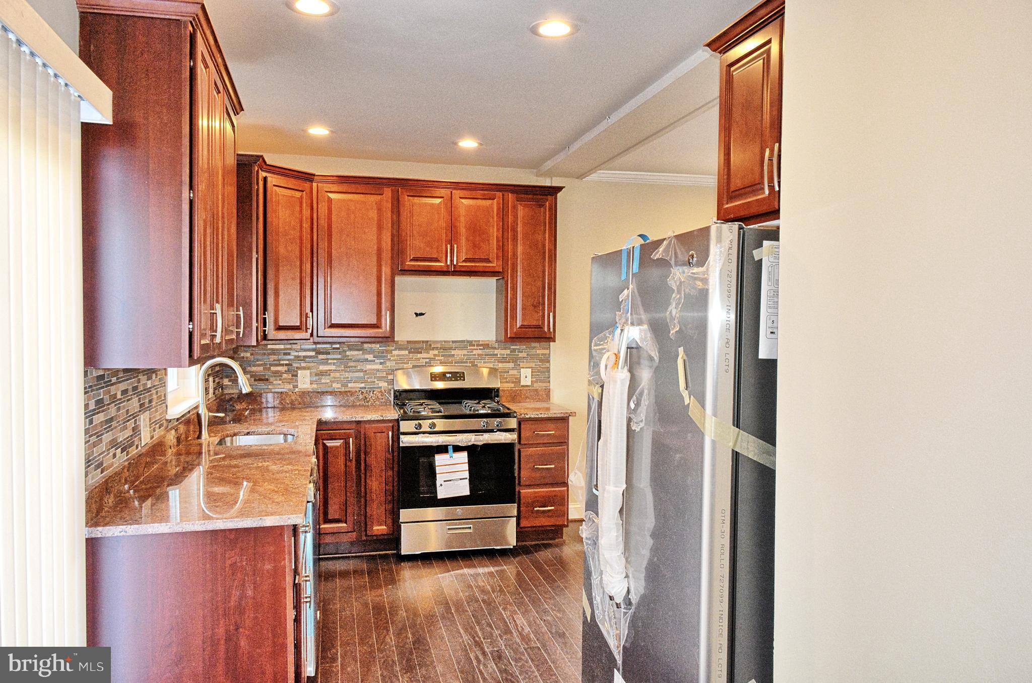 114 West Hilltop Road Baltimore, MD 21225 - Photo 8 of 17 Kitchen