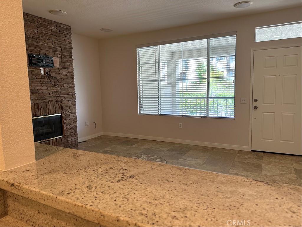 337 Chaumont Circle Lake Forest, CA 92610 - Photo 13 of 32 a view of an empty room with a window