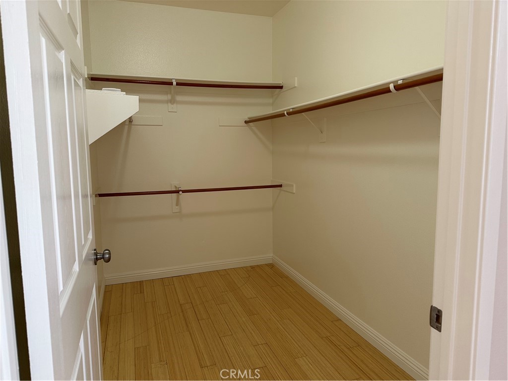 337 Chaumont Circle Lake Forest, CA 92610 - Photo 17 of 32 a view of walk in closet with empty racks