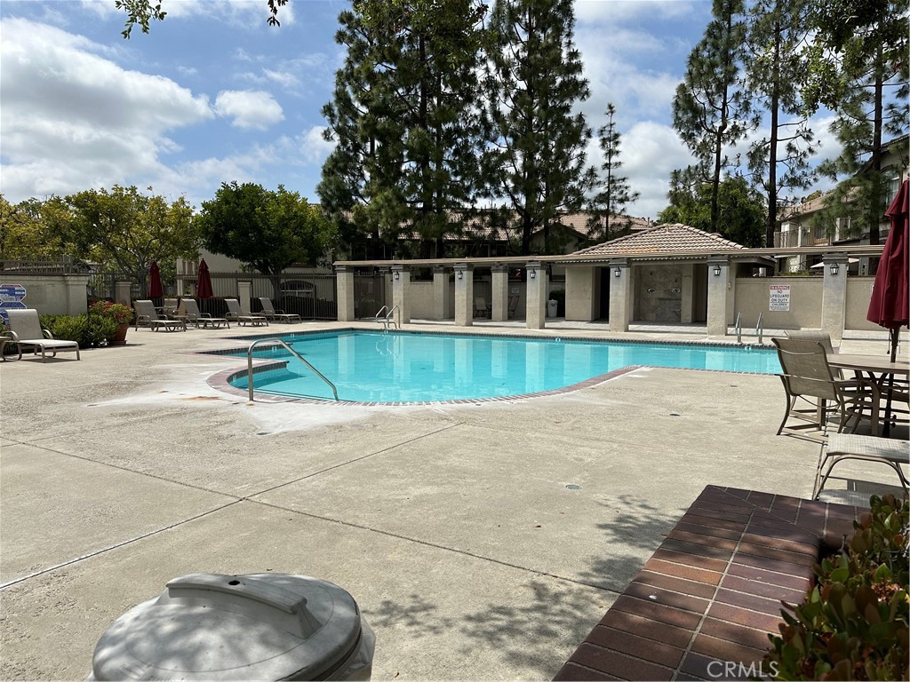 337 Chaumont Circle Lake Forest, CA 92610 - Photo 29 of 32 a backyard of a house with table and chairs
