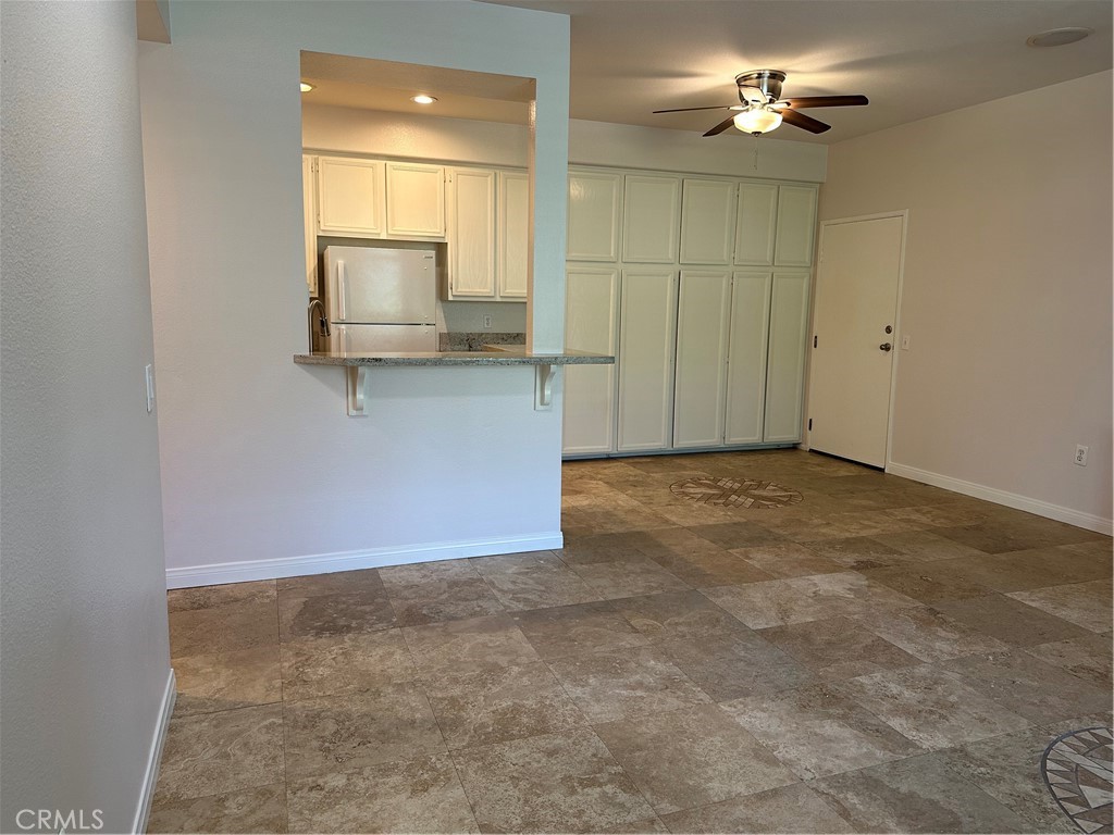 337 Chaumont Circle Lake Forest, CA 92610 - Photo 5 of 32 a view of a livingroom with a bathroom and a sink