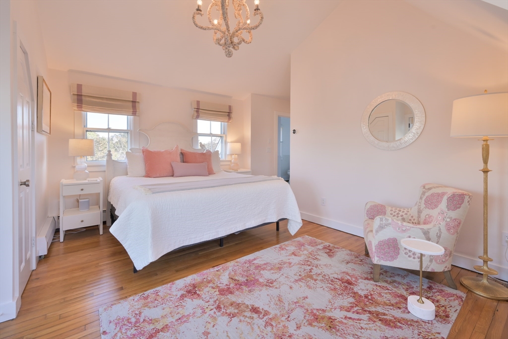 63 Monomoy Road Nantucket, MA 02554 - Photo 16 of 35 a bedroom with a bed and window