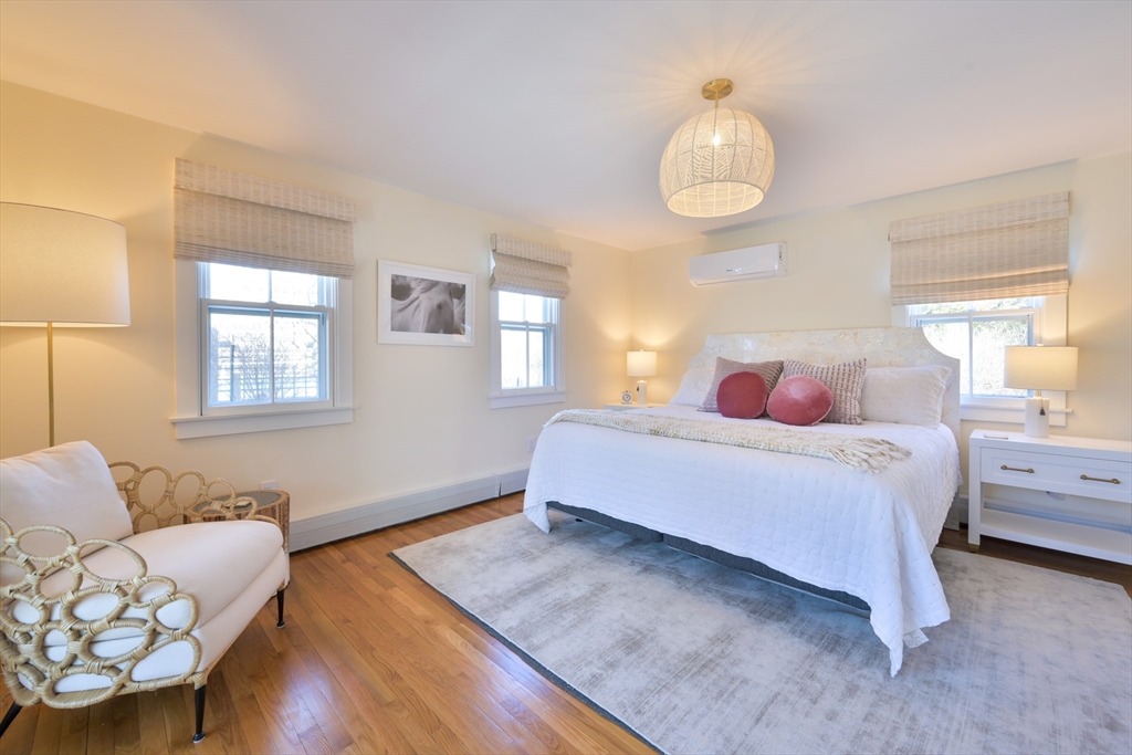 63 Monomoy Road Nantucket, MA 02554 - Photo 6 of 35 a bedroom with a bed and window