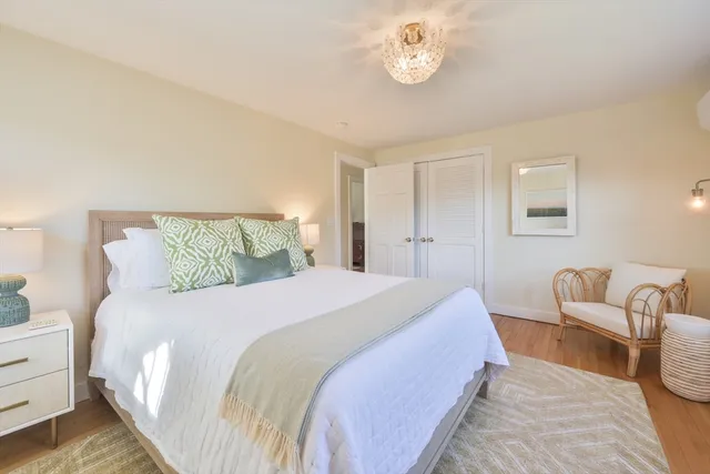 a bedroom with bed and window