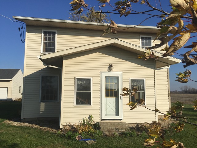 774 Pump Factory Road Amboy, IL 61310 - Photo 2 of 12 a view of a house with a yard