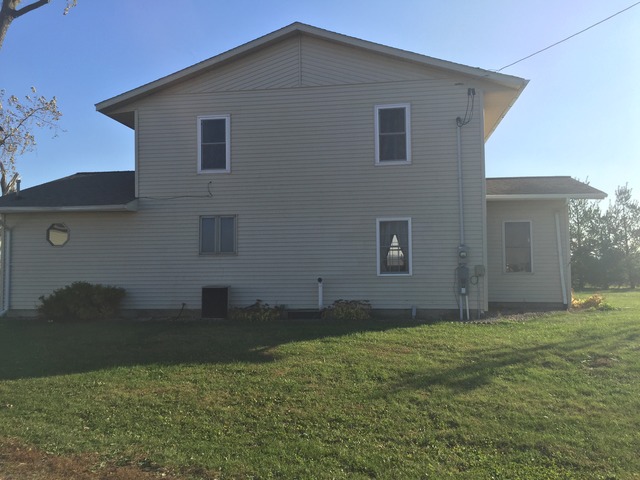 774 Pump Factory Road Amboy, IL 61310 - Photo 3 of 12 a house view with a outdoor space