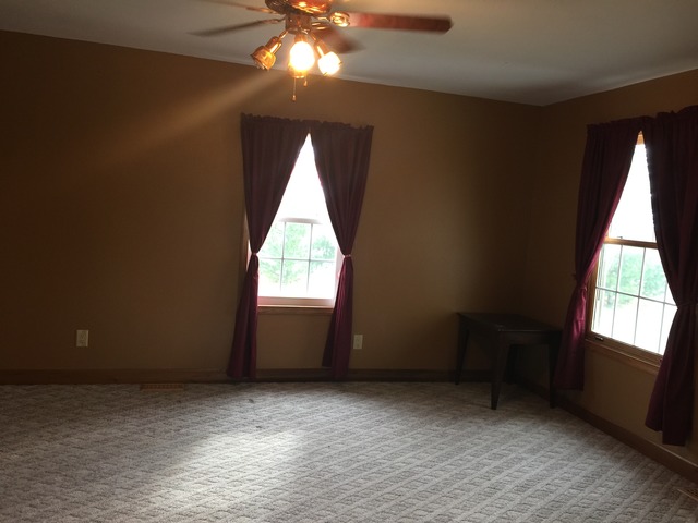 774 Pump Factory Road Amboy, IL 61310 - Photo 8 of 12 a view of an empty room with a window
