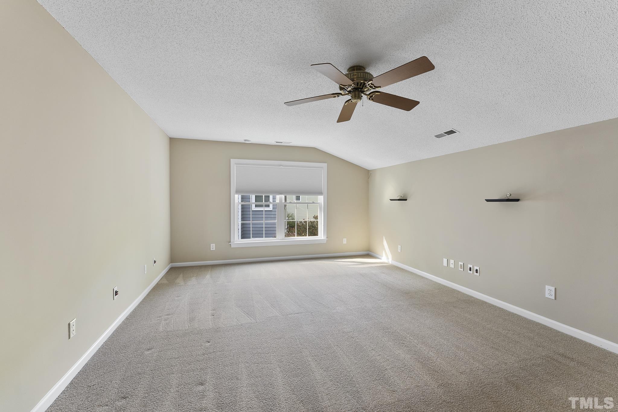 313 Catlin Road Cary, NC 27519 - Photo 15 of 27 a view of an empty room with a window