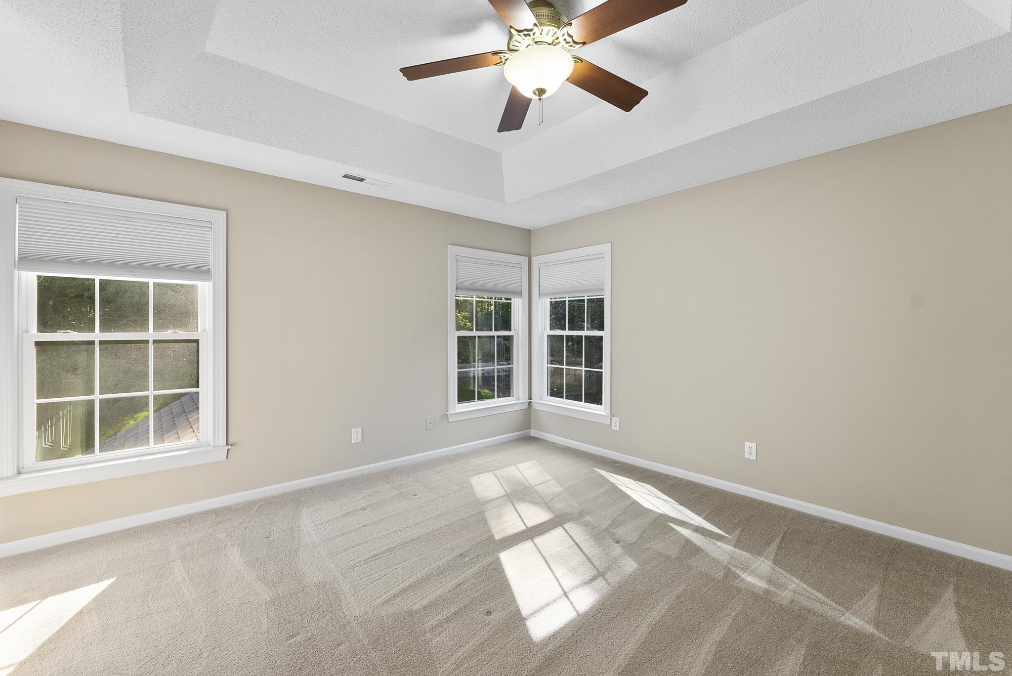 313 Catlin Road Cary, NC 27519 - Photo 16 of 27 a view of an empty room with a window
