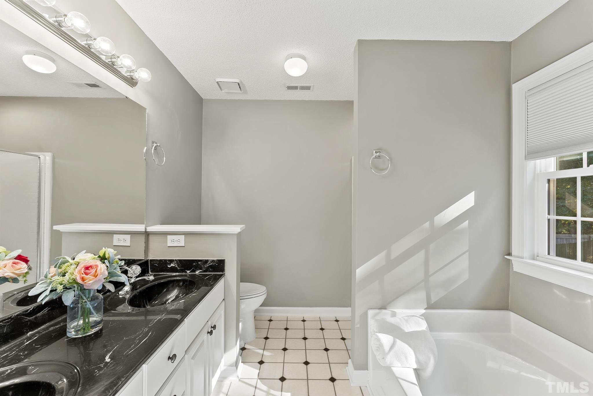 313 Catlin Road Cary, NC 27519 - Photo 19 of 27 a kitchen with sink and cabinets