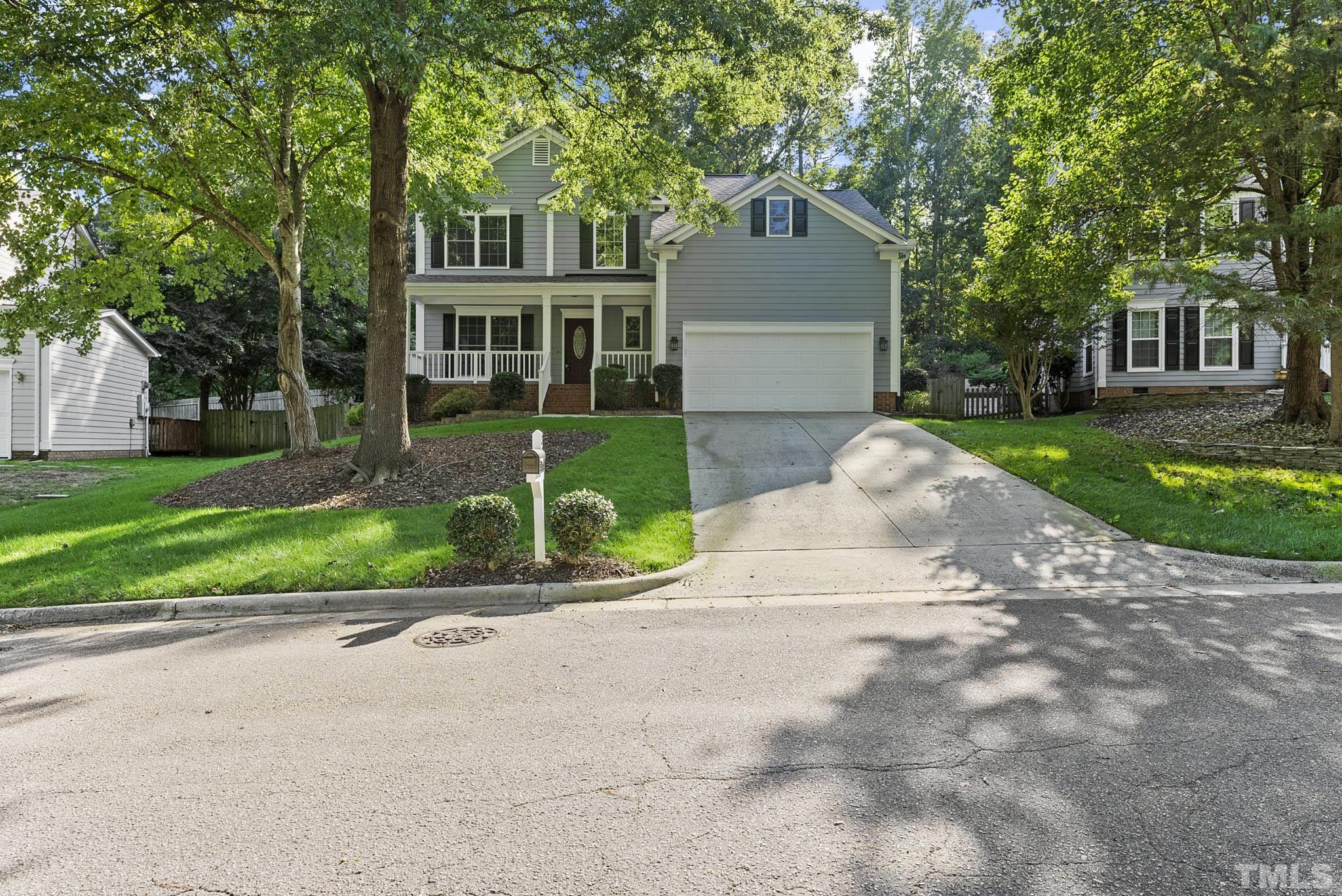 313 Catlin Road Cary, NC 27519 - Photo 2 of 27 a front view of house with yard and green space