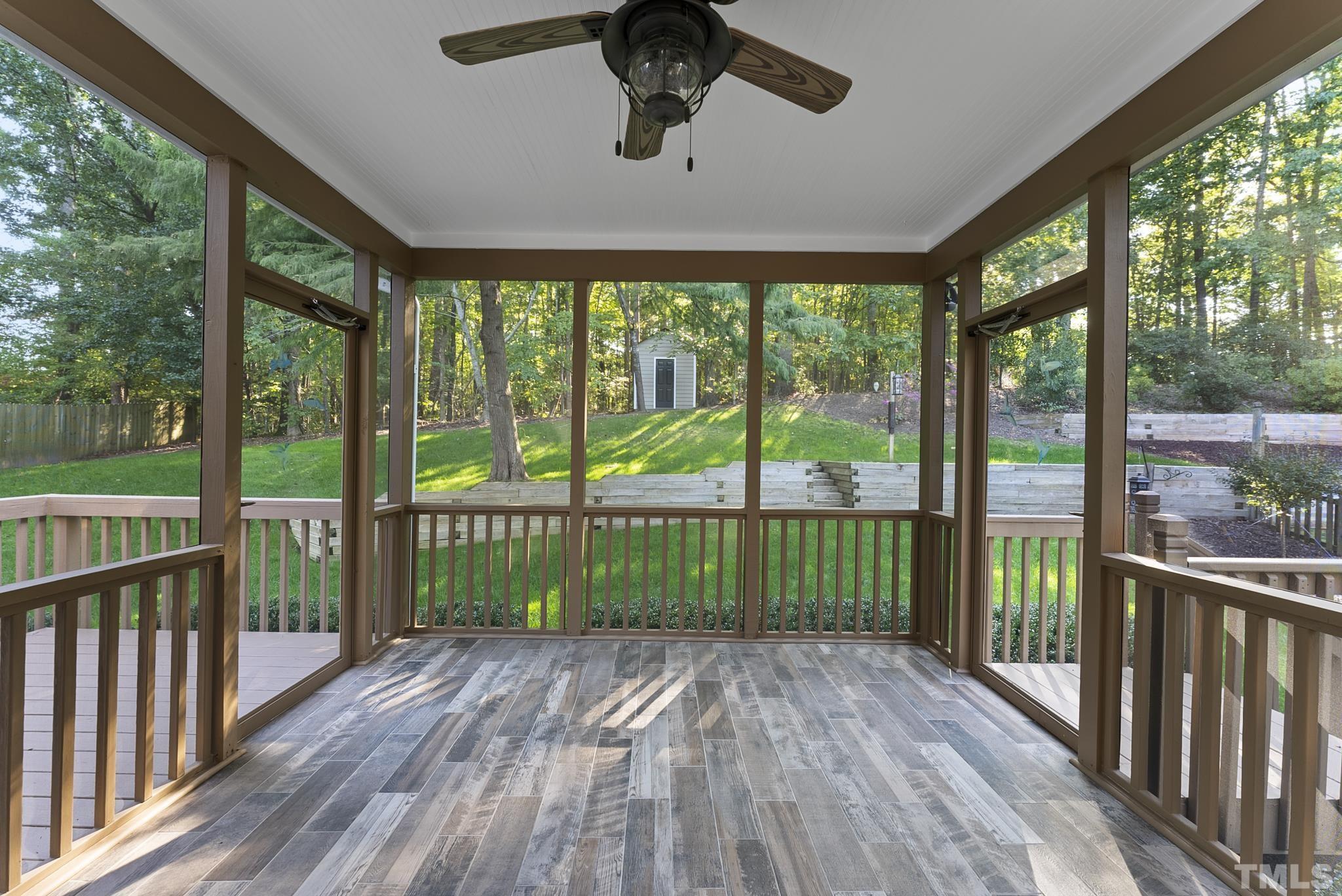 313 Catlin Road Cary, NC 27519 - Photo 24 of 27 a view of a balcony with wooden floor