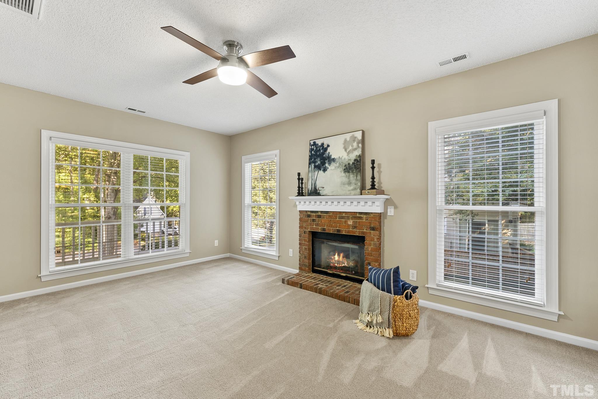 313 Catlin Road Cary, NC 27519 - Photo 4 of 27 a living room with furniture and a window